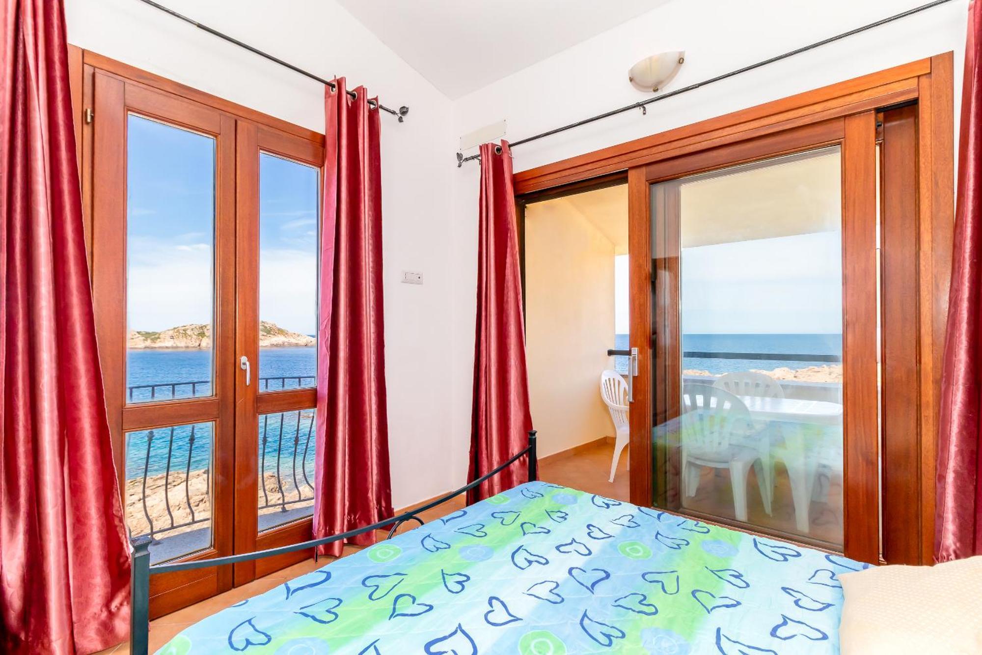 Appartamento Casa sulla Scogliera Isola Rossa Esterno foto