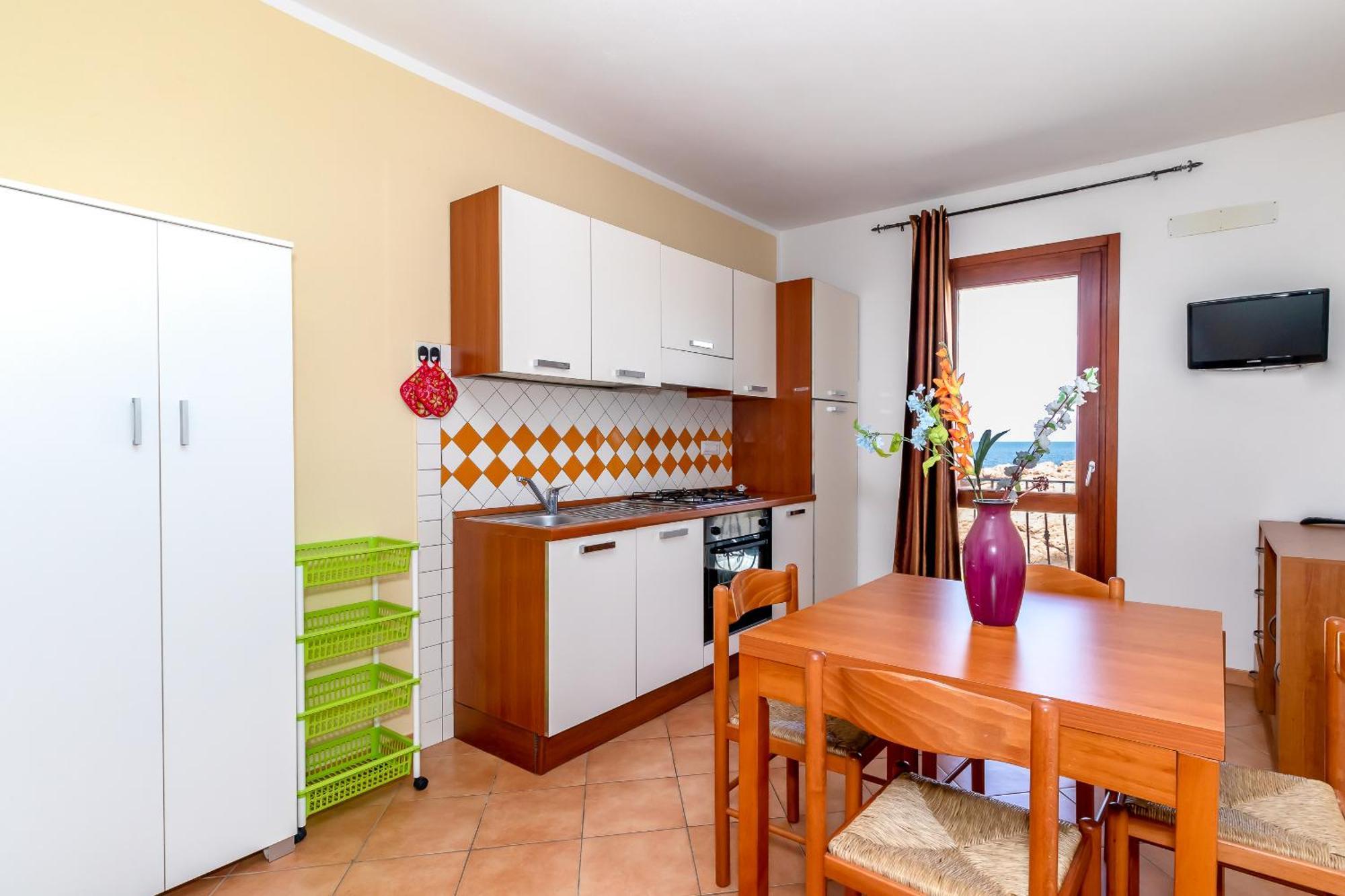 Appartamento Casa sulla Scogliera Isola Rossa Esterno foto