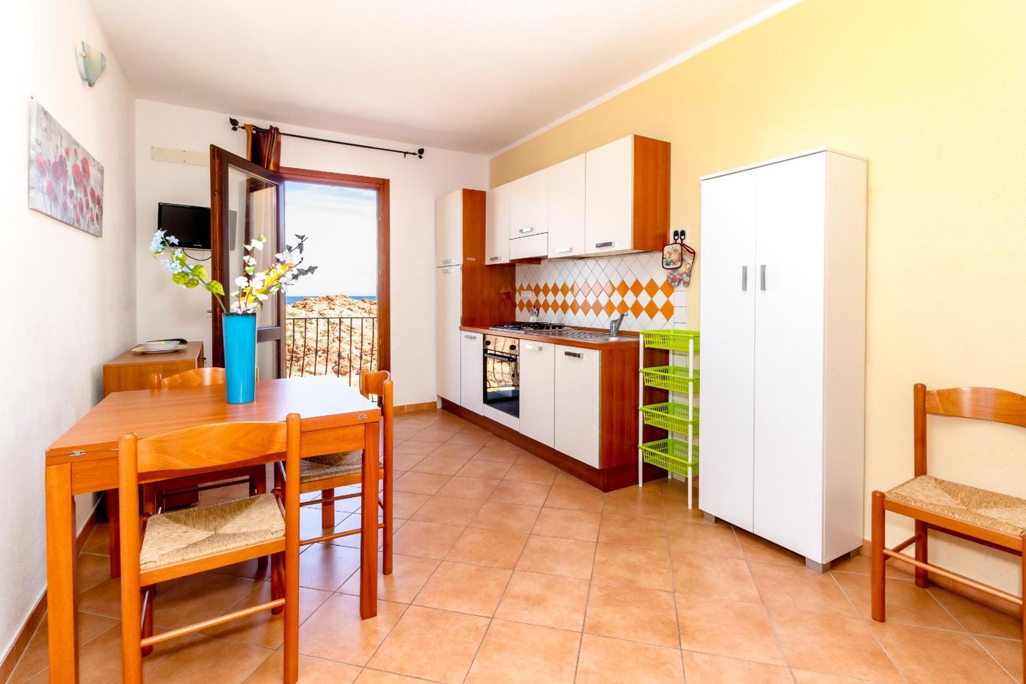 Appartamento Casa sulla Scogliera Isola Rossa Esterno foto